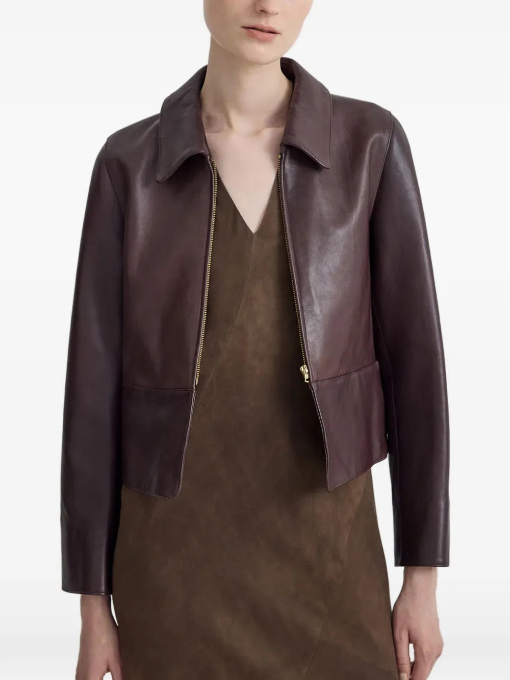 Burgundy jacket worn by a person, showing the jacket fit