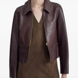 Burgundy jacket worn by a person, showing the jacket fit