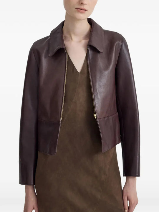 Burgundy jacket worn by a person, showing the jacket fit