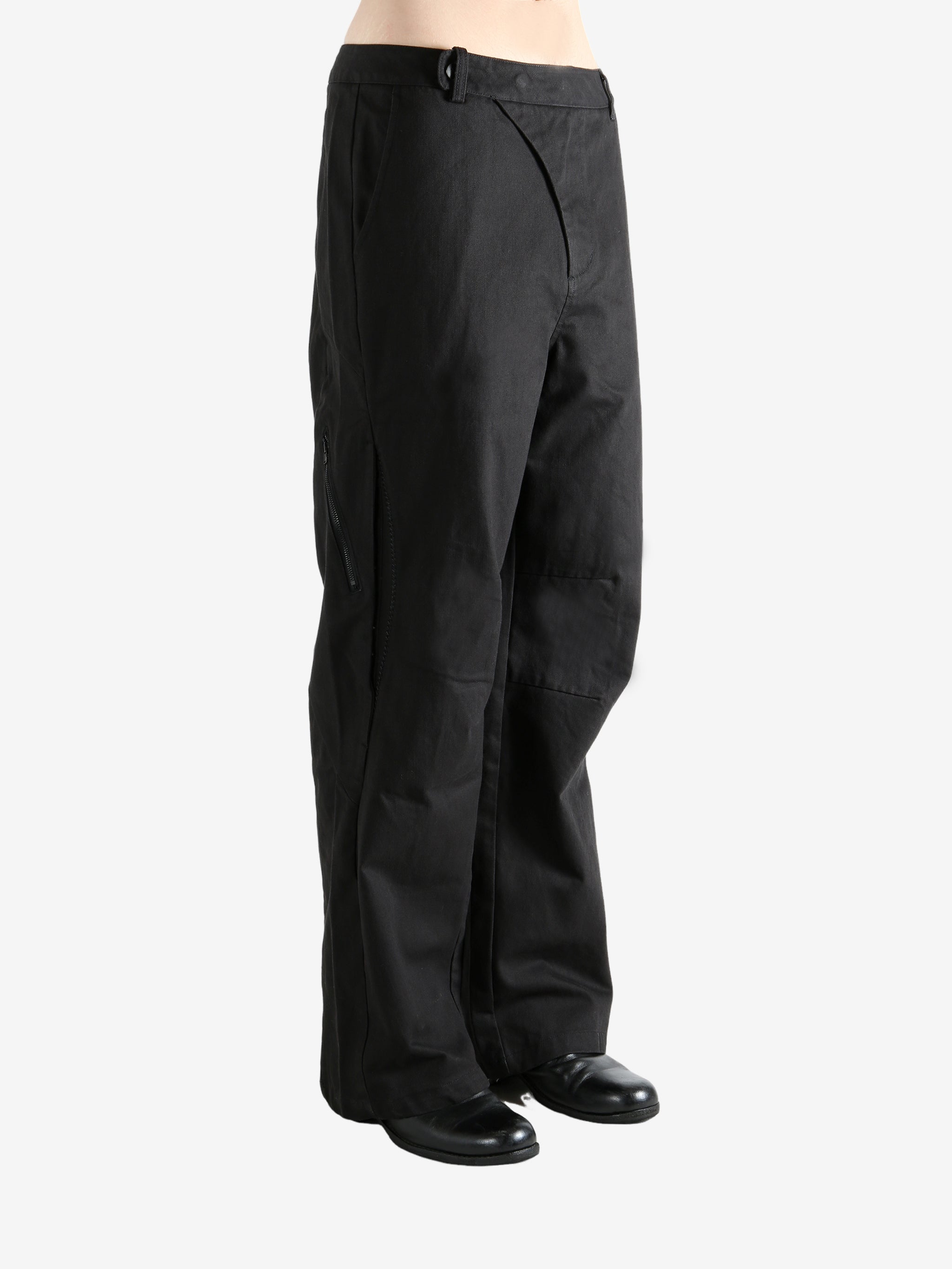 Black  pant worn by a person, showing the pant's fit