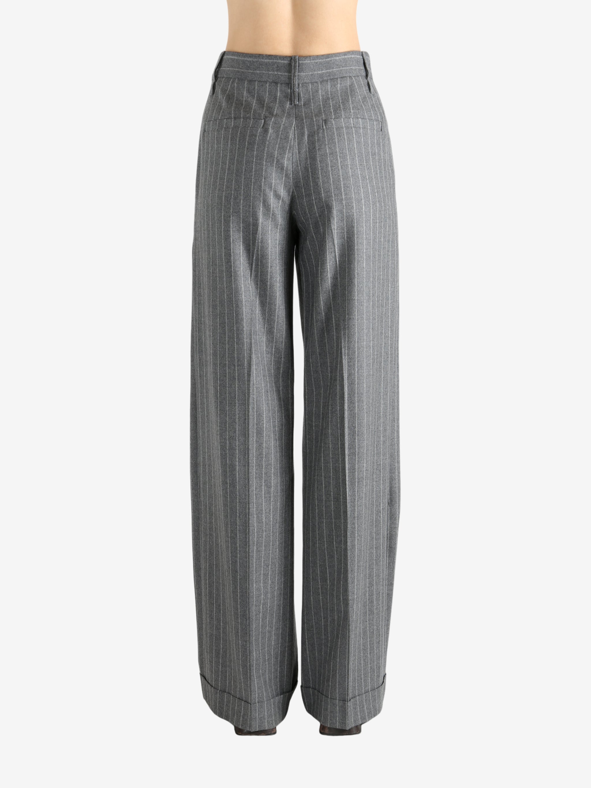 Grey pants worn by a person, showing the pant's fit