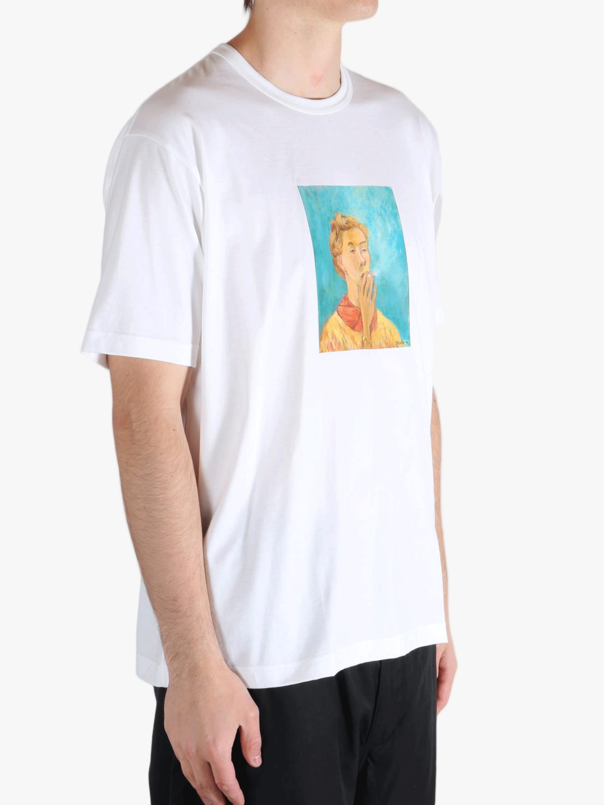 White t-shirt worn by a person, showing the t-shirt's fit