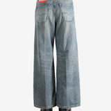 Blue jeans worn by a person, showing the jeans fit