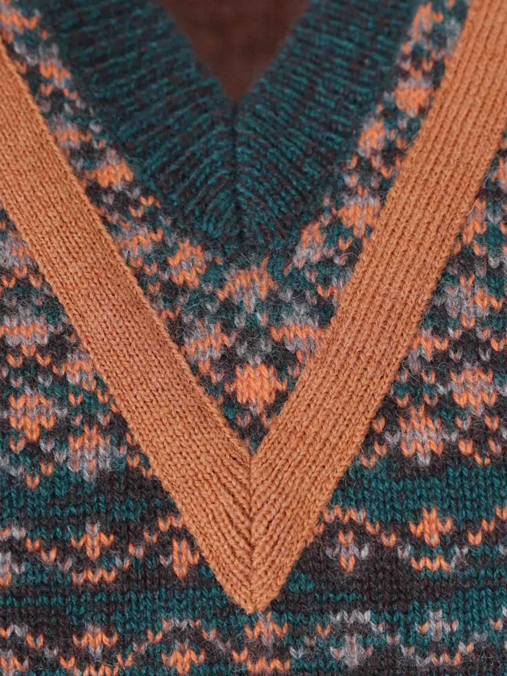 Close up of Green hoodie, showing texture of the 100% polyester fabric