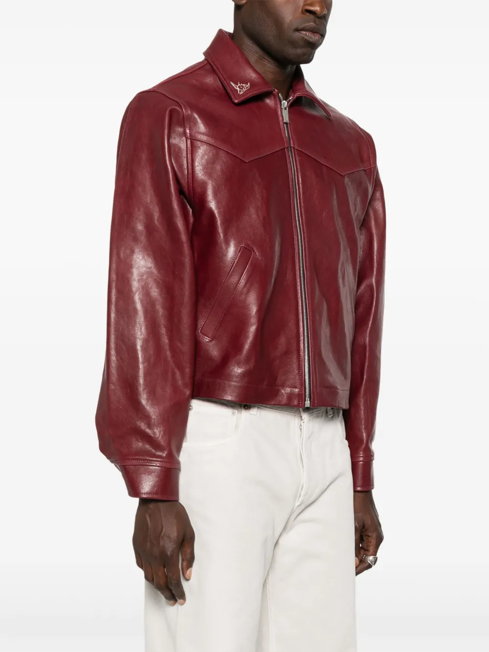 Red jacket worn by a person, showing the jacket fit