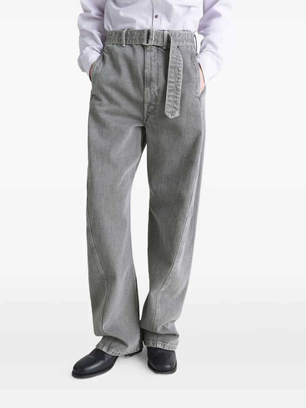 Grey pants worn by a person, showing the pants' fit