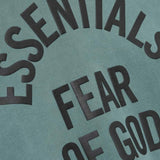 Cloes-up of green hooide, showing texture of the cotton fabric