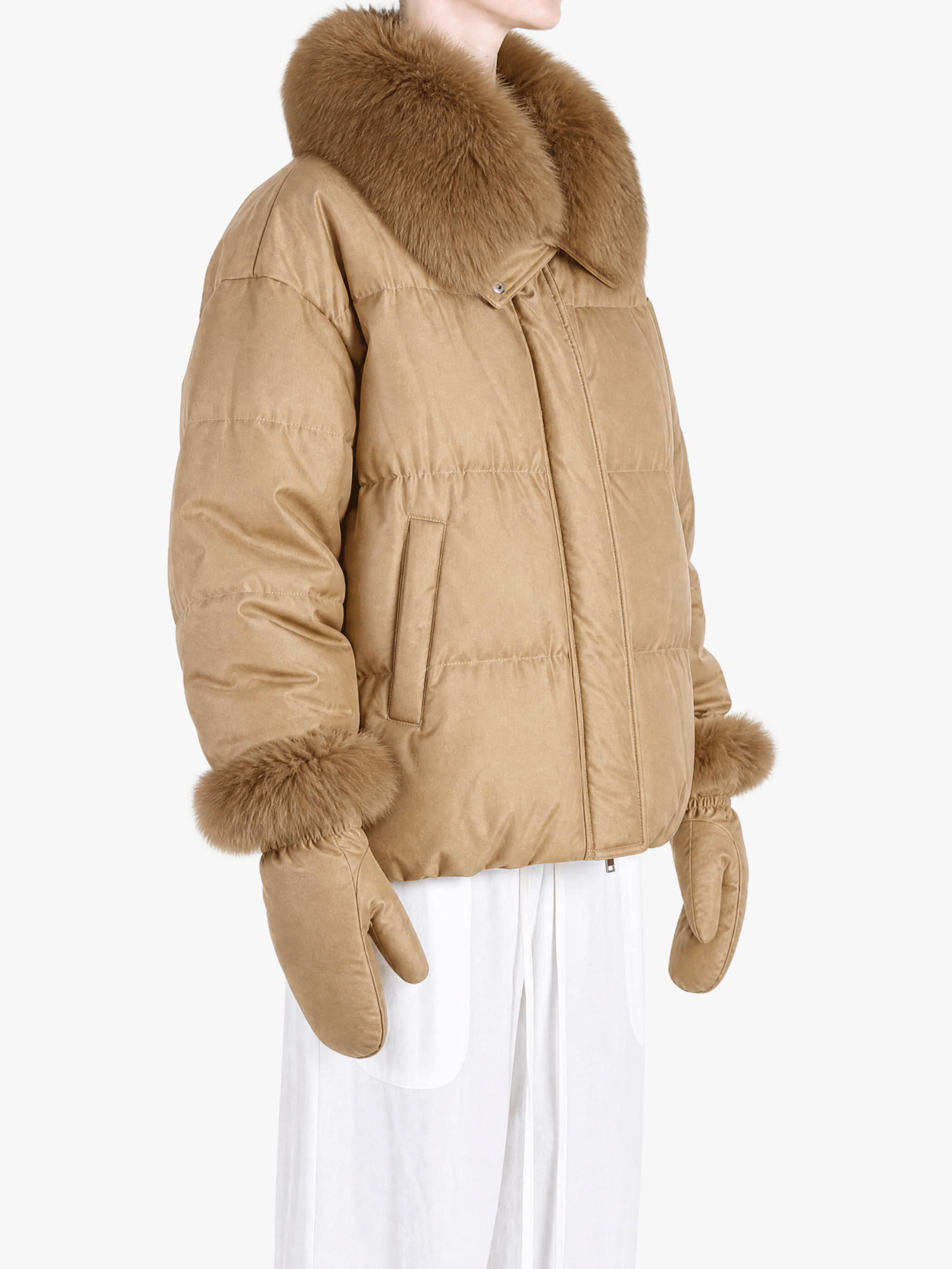 Tan jacket worn by a person, showing the jacket fit
