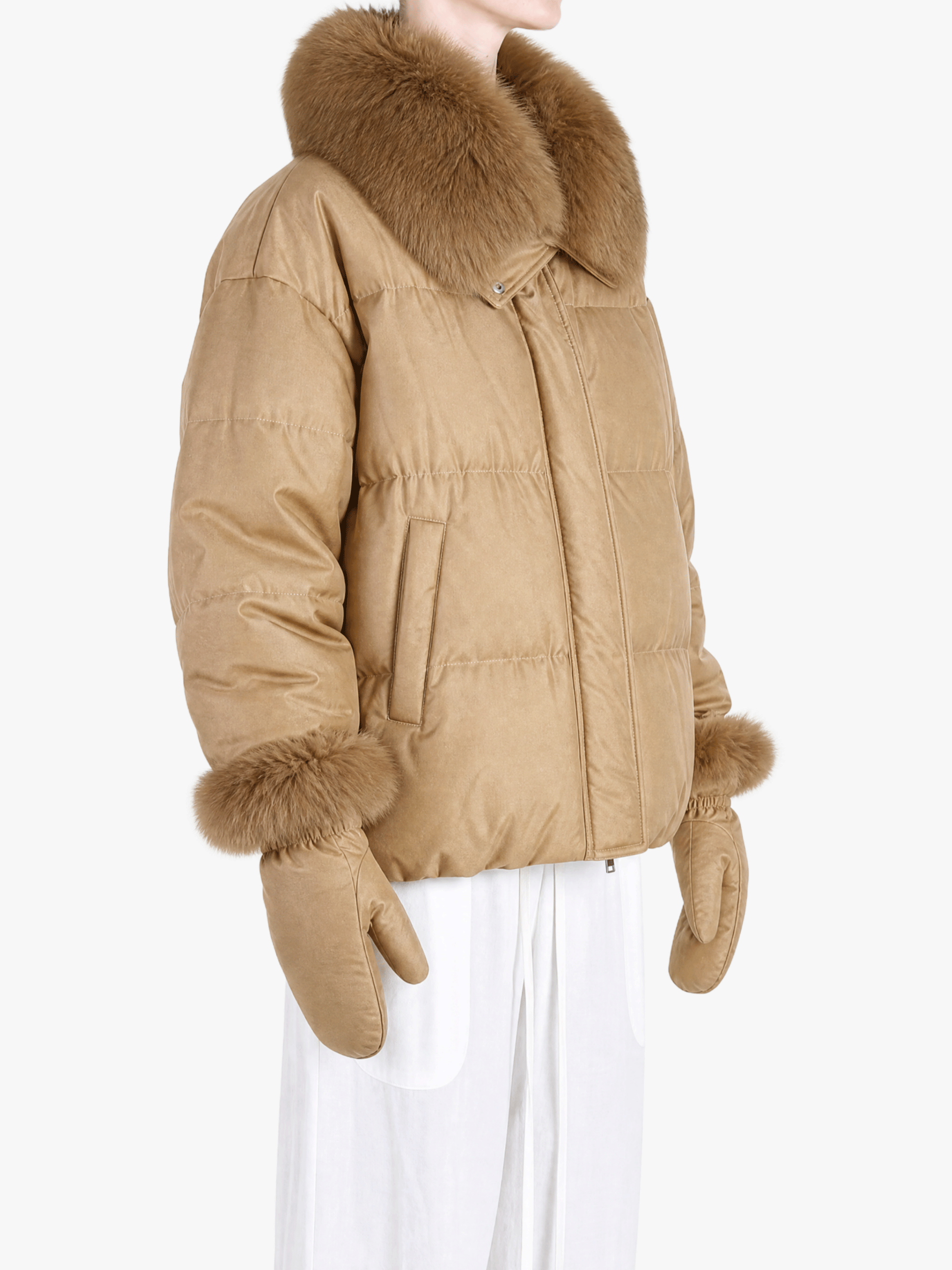 Tan jacket worn by a person, showing the jacket fit