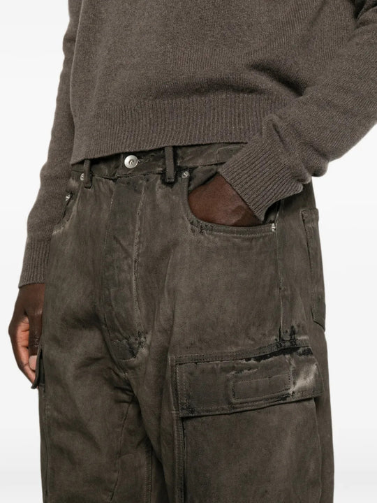 Grey jeans worn by a person, showing the jeans fit