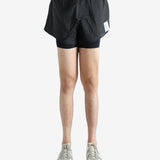 Black shorts worn by a person, showing the shorts fit