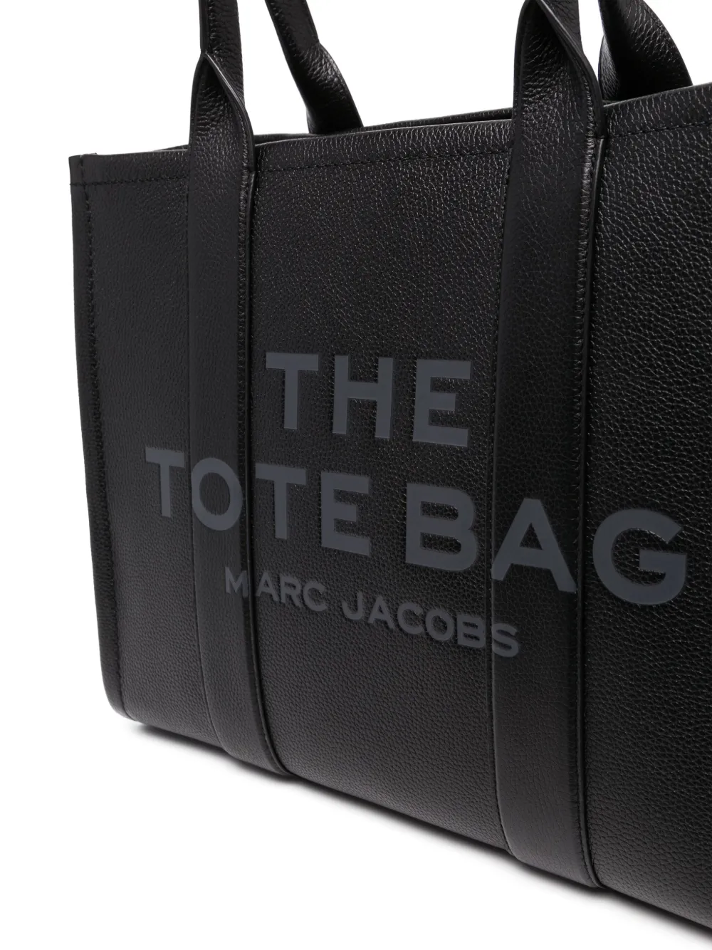 Close up of black bag, showing texture of the calf leather fabric