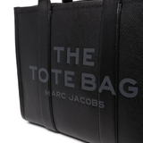 Close up of black bag, showing texture of the calf leather fabric