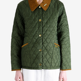 Green jacket worn by a person, showing the jacket fit