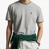 Grey t-shirt worn by a person, showing the t-shirt fit