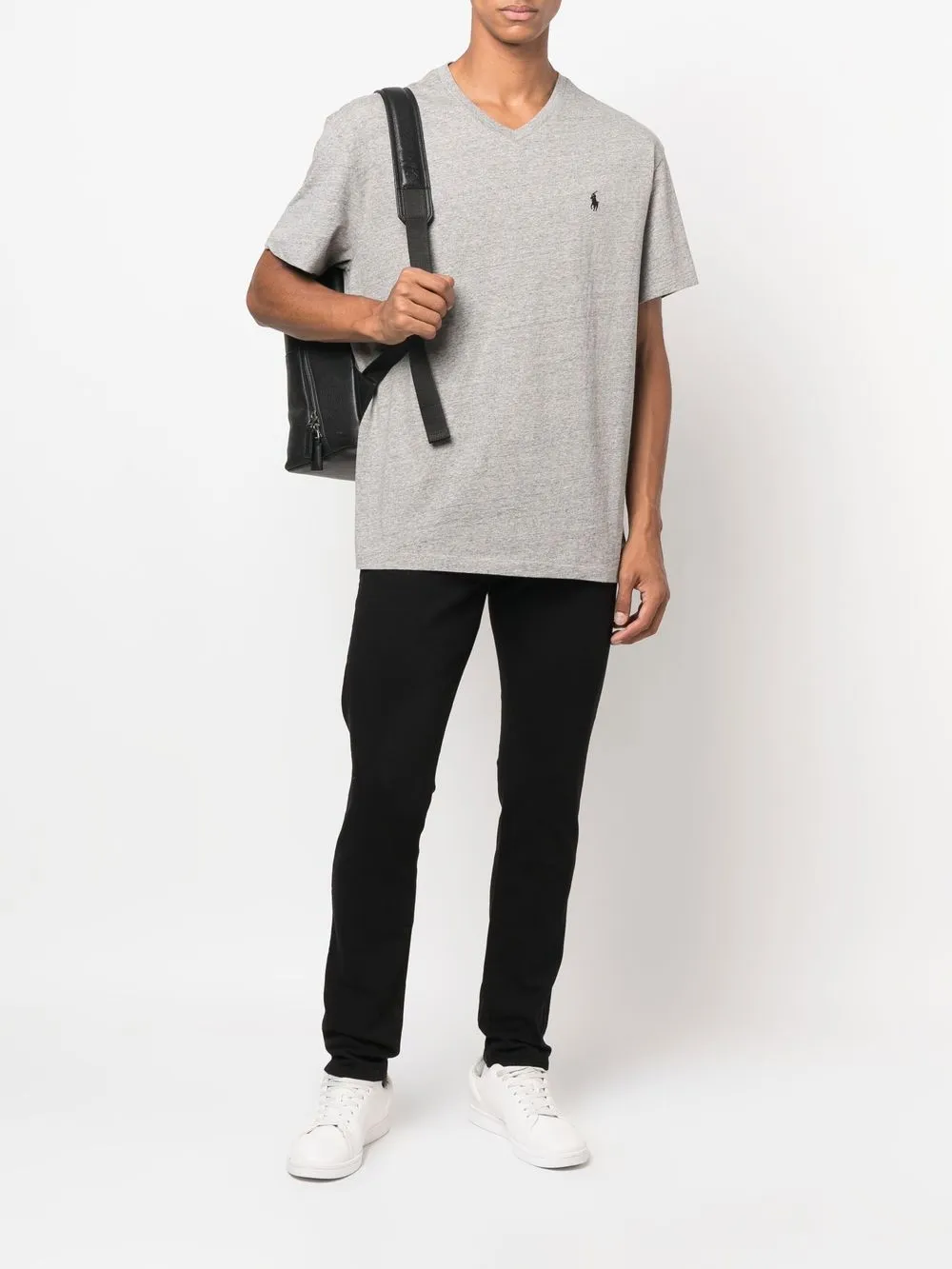 Grey T-shirt worn by a person, showing the T-shirt's fit