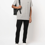 Grey T-shirt worn by a person, showing the T-shirt's fit