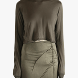 Brown t-shirts worn by a person, showing the t-shirts fit