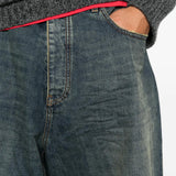 Blue shorts worn by a person, showing the shorts fit