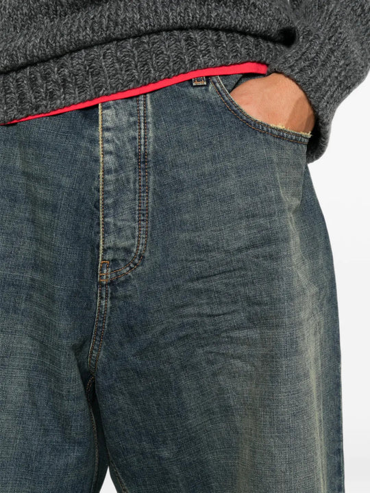Blue shorts worn by a person, showing the shorts fit