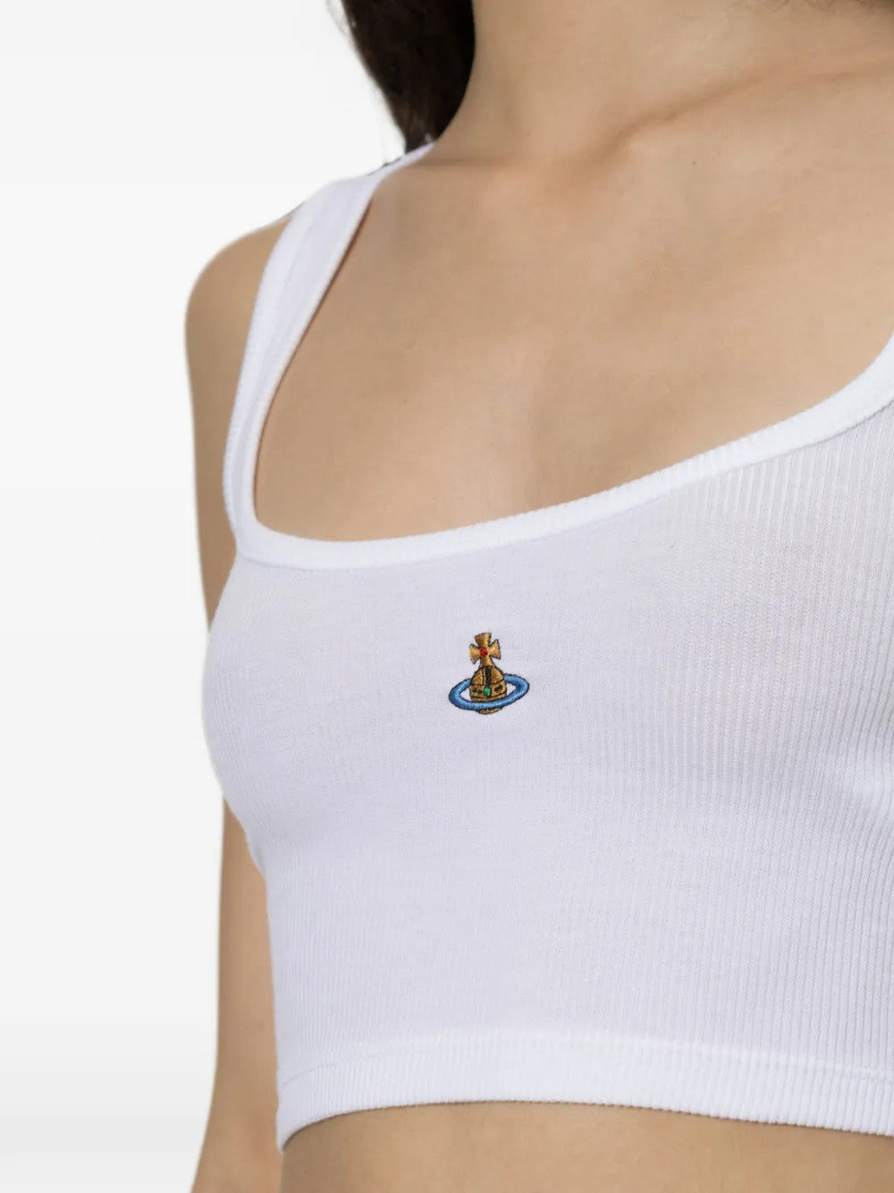 White top worn by a person, showing the top fit
