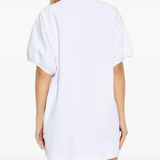 white dress,worn by a person,showing the dress fit