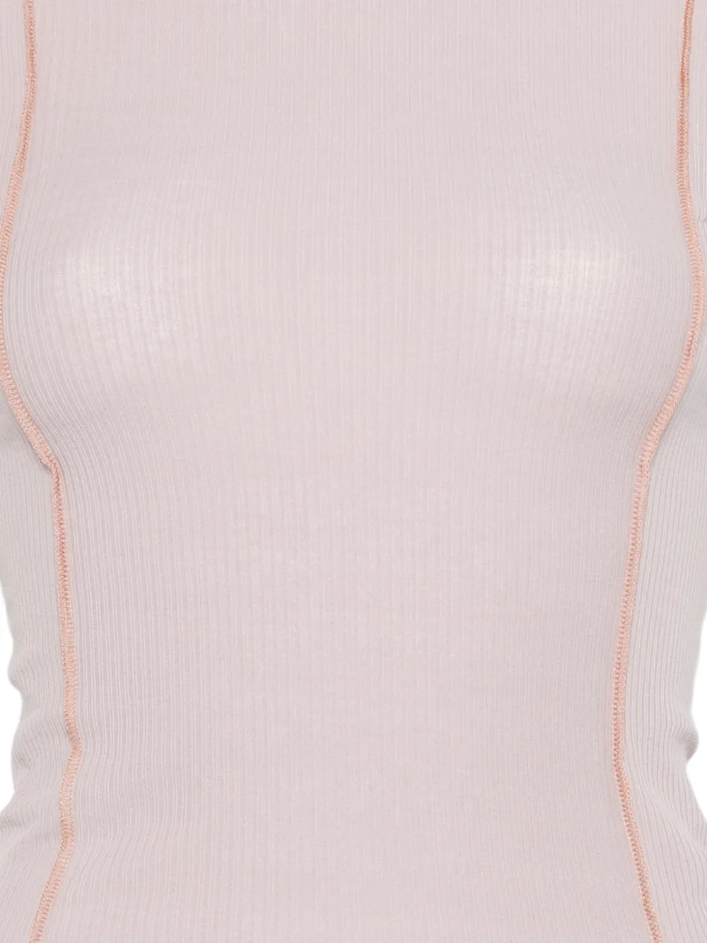 Close up of pink t-shirt, showing texture of the cotton fabric