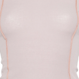 Close up of pink t-shirt, showing texture of the cotton fabric