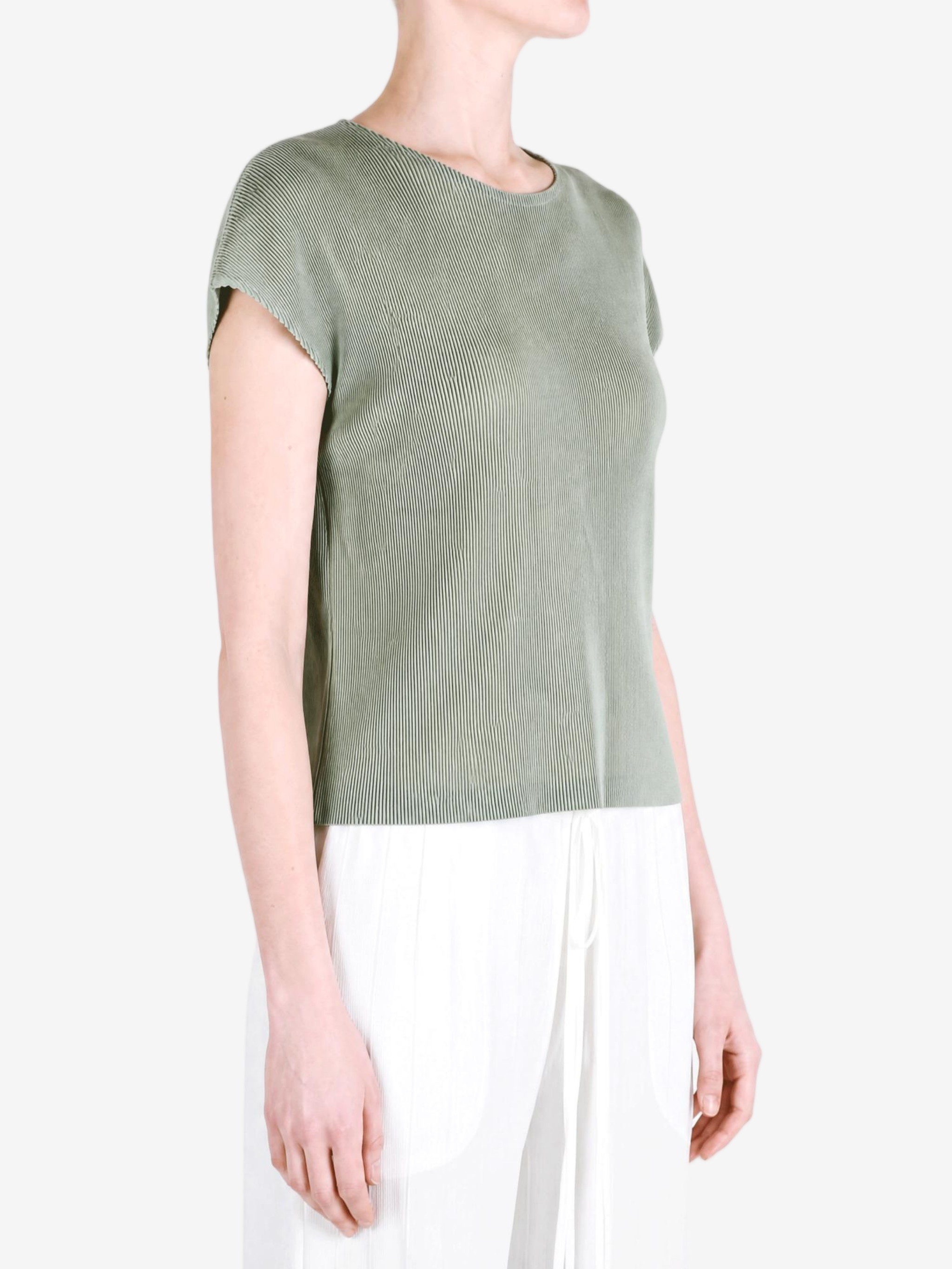 Green shirt worn by a person, showing the shirt fit