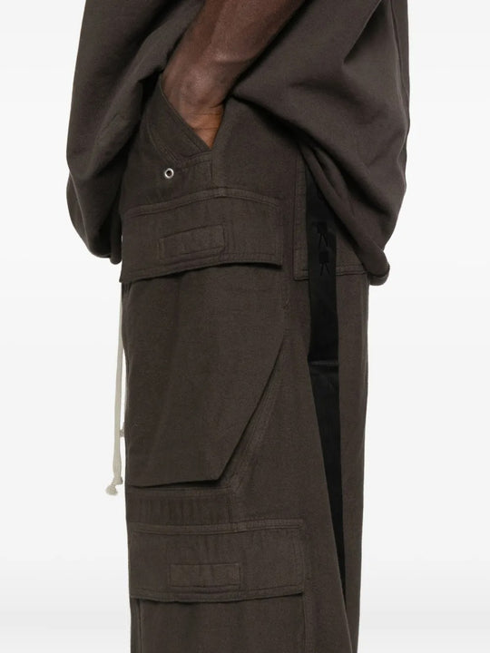 Close up of the brown pants, showing texture of the wool fabric