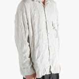 White shirts worn by a person, showing the shirts fit