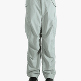 Grey pant worn by a person, showing the pant's fit