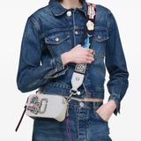 White bag worn by a person, showing the bag fit