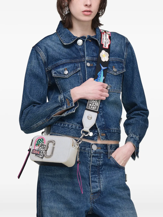 White bag worn by a person, showing the bag fit