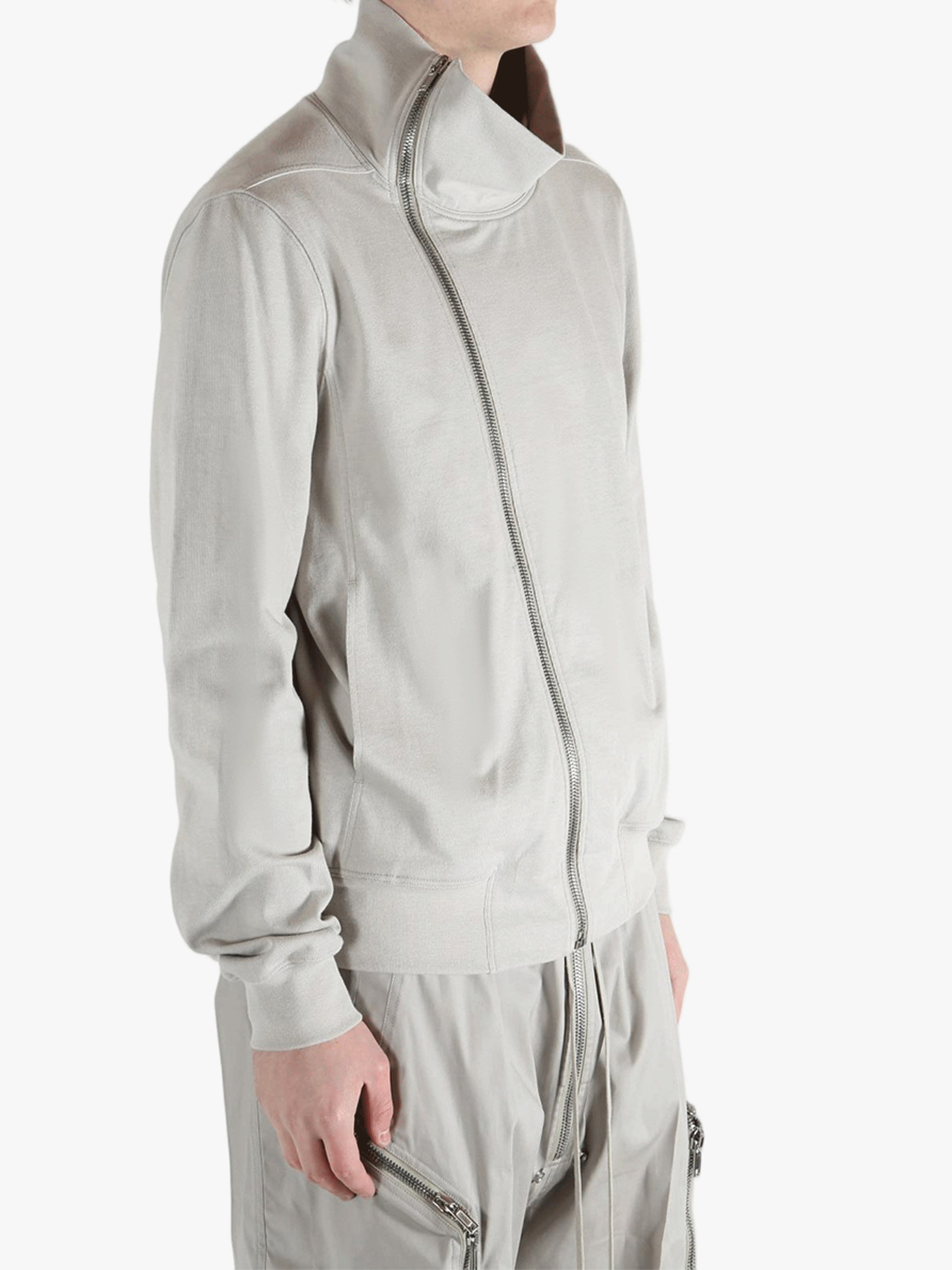 Grey t-shirts worn by a person, showing the t-shirts fit