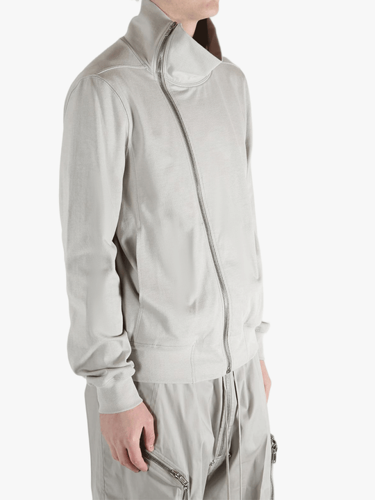 Grey t-shirts worn by a person, showing the t-shirts fit