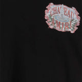 Close up of black T-shirts, showing texture of the fabric