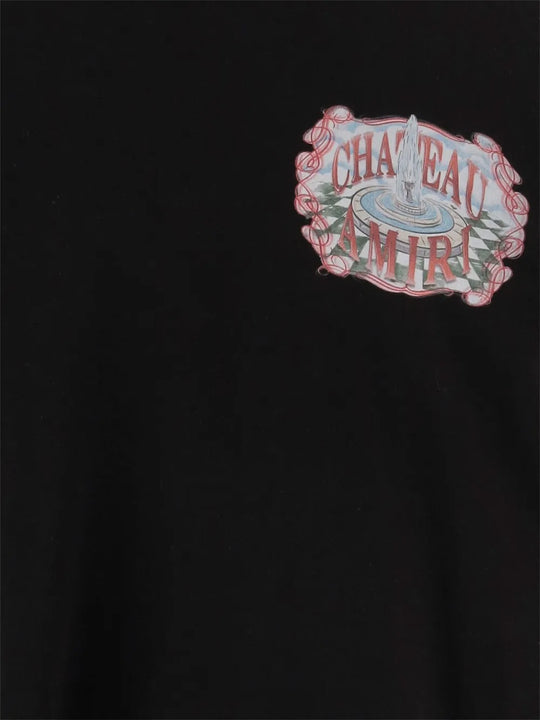 Close up of black T-shirts, showing texture of the fabric