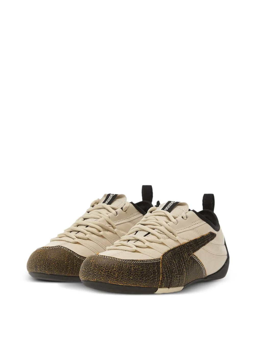 Tan sneakers, side view