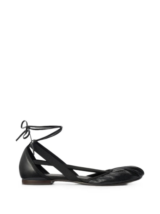 Black flats, side view
