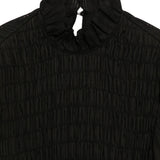 Close up of Black top, showing texture of the 100% cotton fabric