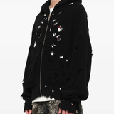 Black hoodie worn by a person, showing the hoodie fit