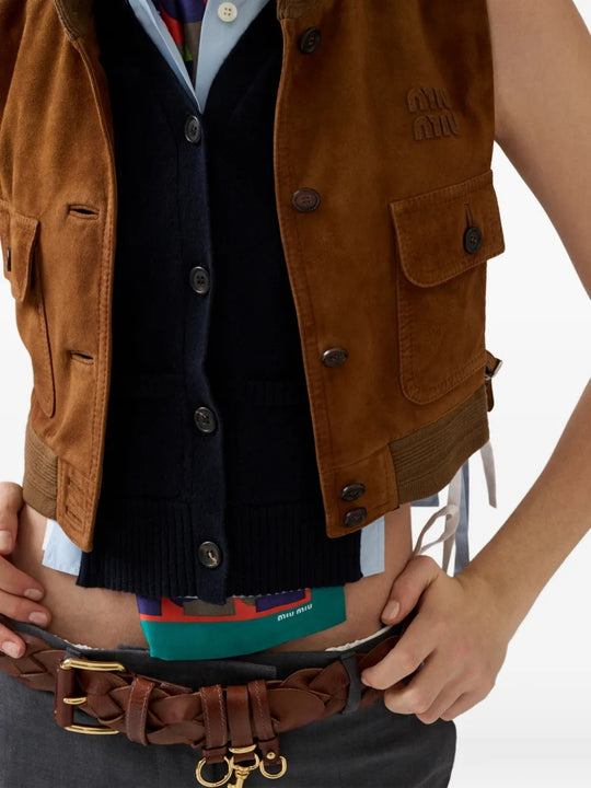 Cloes up of blue cardigan, showing texture of the cashmere fabric