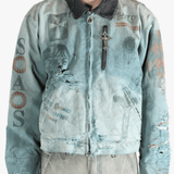 Grey jacket worn by a person, showing the jacket's fit