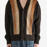 Brown sweater worn by a person, showing the sweater fit