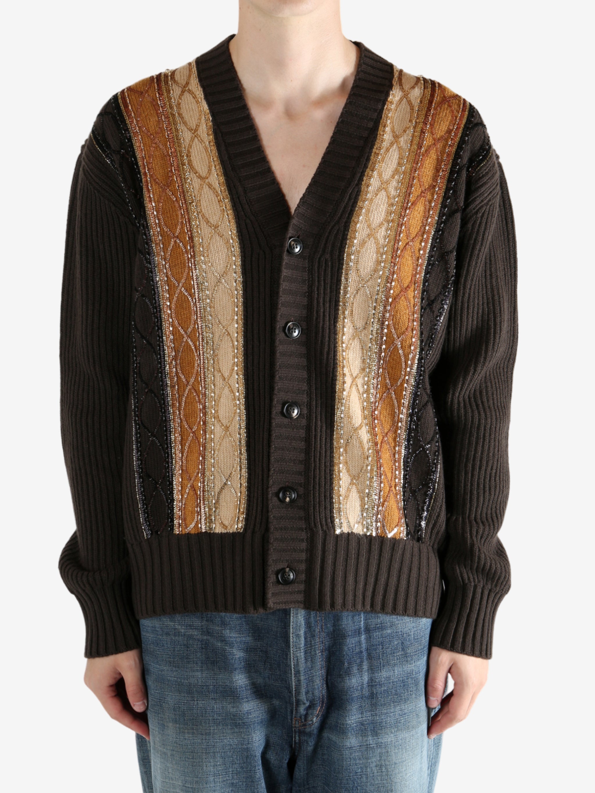 Brown sweater worn by a person, showing the sweater fit