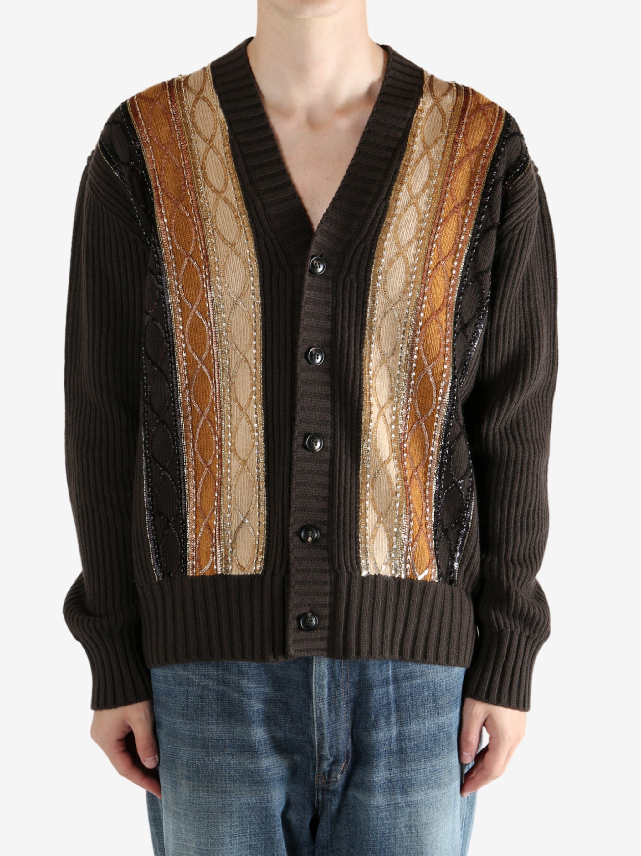 Brown sweater worn by a person, showing the sweater fit