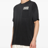 black t-shirt worn by a person, showing the t-shirt fit