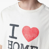 White t-shirt worn by a person, showing the t-shirt fit