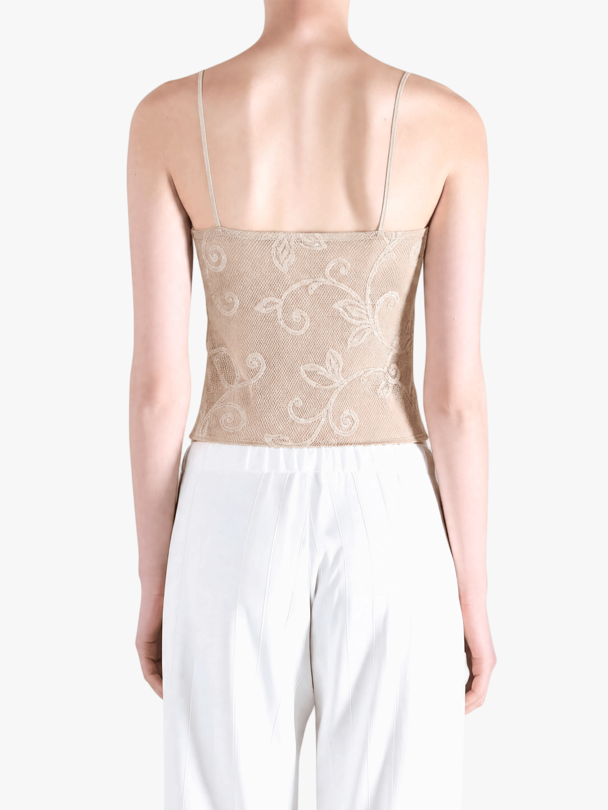 Tan top worn by a person, showing the top fit